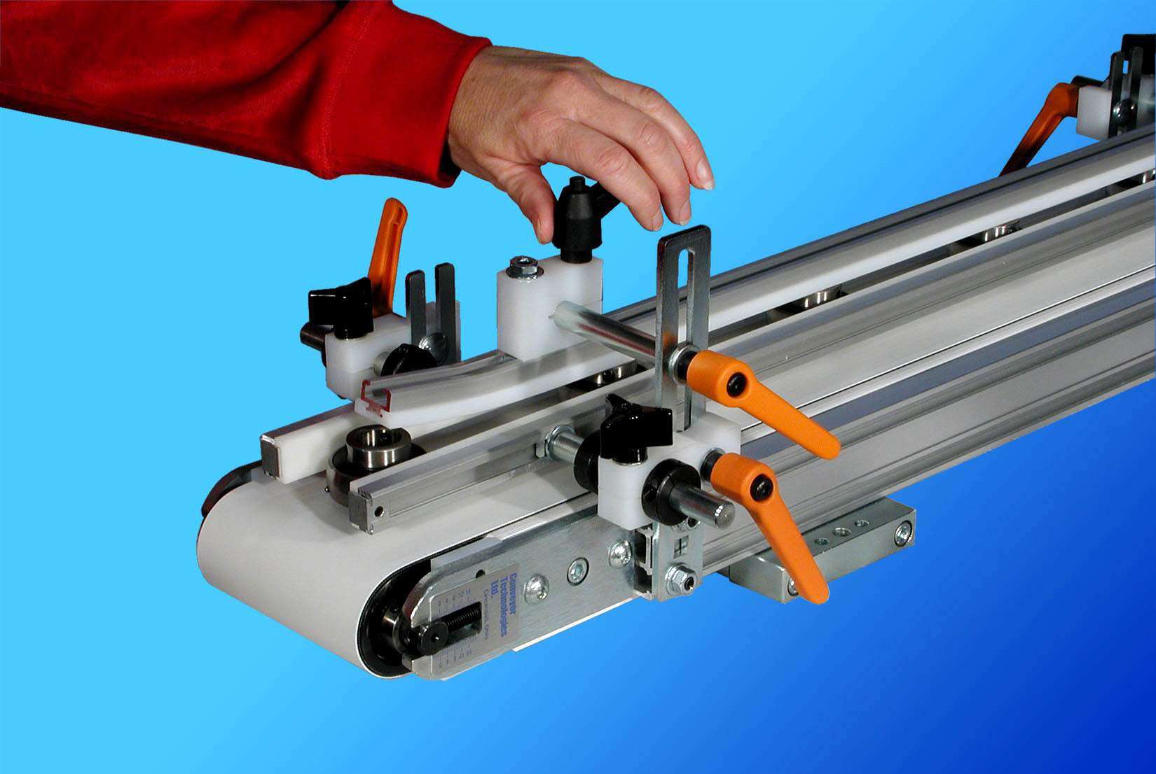 New System of ToolFreeAdjustable Side Rails, Overhead HoldDowns and