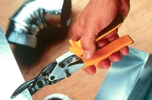 Tin Snips cut stainless steel and other metals.