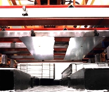 Sheet Metal Equipment destacks, feeds, conveys and washes.