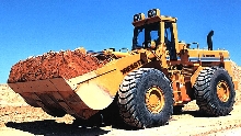 Wheel Loader offers 60,000 lb breakout force.