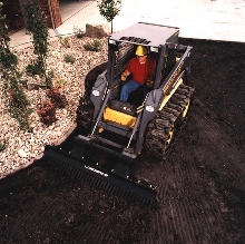 Skid-Steer Attachment has large scarifying teeth.