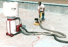 Crack Chasing Saw routs cracks and joints at 6 to 8 ft/min.