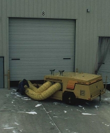 Portable Heater keeps workers and equipment warm.