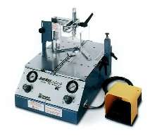 Assembly Machine joins 100 picture frames per hour.