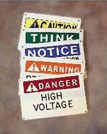 Safety Signs feature 3-color, 3-D engraved design.