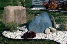 Landscape Rocks hide unsightly pipes and vents.