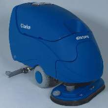 Floor Scrubber has dual cylindrical scrub brushes.