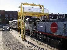 Gantry provides access to railcar air conditioning units.
