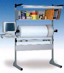 Packaging Accessory Station positions shipping/packing materials.