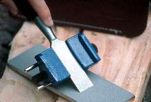 Kit provides tools for sharpening chisels and router bits.