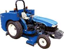 Tractor Scrubber cleans large outdoor facilities.