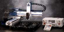 Dispensing Robots have working areas to 32 x 24 in.