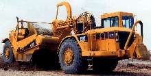 Wheel Tractor Scrapers have dual power capabilities.