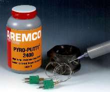 Adhesive bonds thermocouples for high temperature uses.