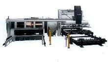 Laser System includes material storage tower.