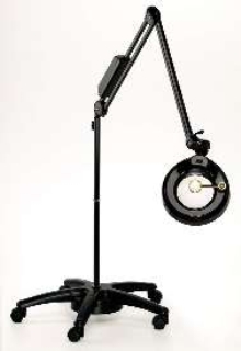 Magnifiers feature base with casters for mobility.
