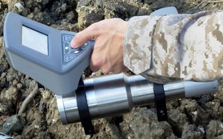 Portable Device IDs radiation at/below background levels.