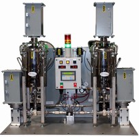 Machine dispenses precise amount of mixed silver epoxy.