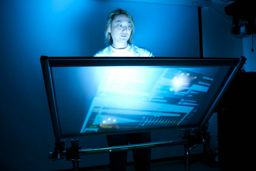 Victor Wong with Music Computing's MotionCOMMAND ClearView Touch-Screen.