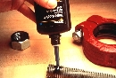 Machinery Adhesives lock and seal nuts and bolts.