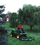 Front Mower has 36 hp motor for 15 mph transportation.
