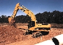 Excavator uses 2-pump, negative flow hydraulic system.