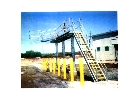 Stationary Platforms service trucks and tank cars.