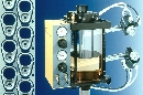 Can Tab Lubricator cuts oil use, reduces rejects.