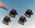 Directional Coupler is wound on dual aperture ferrite cores.