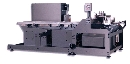 Modular Infeed System places labels with accuracy  to .005 in.