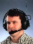 Two-Way Radio Headset transmits and receives up to 2 miles.