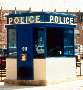 Preassembled Building lets police escape elements.