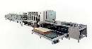 Sheeter protects and stacks material.