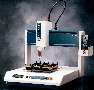 Robot automates large-area dispensing applications.