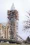 Track Hoist lifts scaffolding and materials.