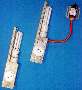 Universal Lamps light electrical/electronic cabinets.