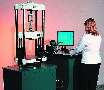 Universal Testing Machine includes handheld controller.