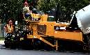 Asphalt Paver offers doors to access all service areas.