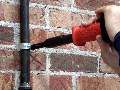 Powder Actuated Fastener is triggered by squeezing grip.