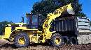 Wheel Loader has low-emissions engine.