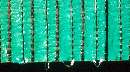 Woven Housewrap has water drainage channels.