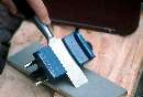 Kit provides tools for sharpening chisels and router bits.