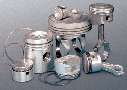 Piston Ring Assembly System suits large diesel pistons.