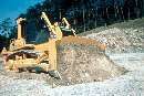 Crawler Dozers feature hydrostatic steering system.