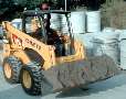 Skid Steer has rated operating load of 2,000 lbs.