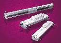 Rodless Rail Slides feature enclosed bearing system.