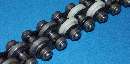 Power and Free Conveyor Chains move pallets and containers.