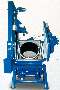 Abrasive Blast Cleaner processes small parts.