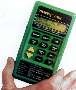 Meter measures moisture content in flooring.