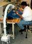 Air Cleaner protects operators during soldering operations.